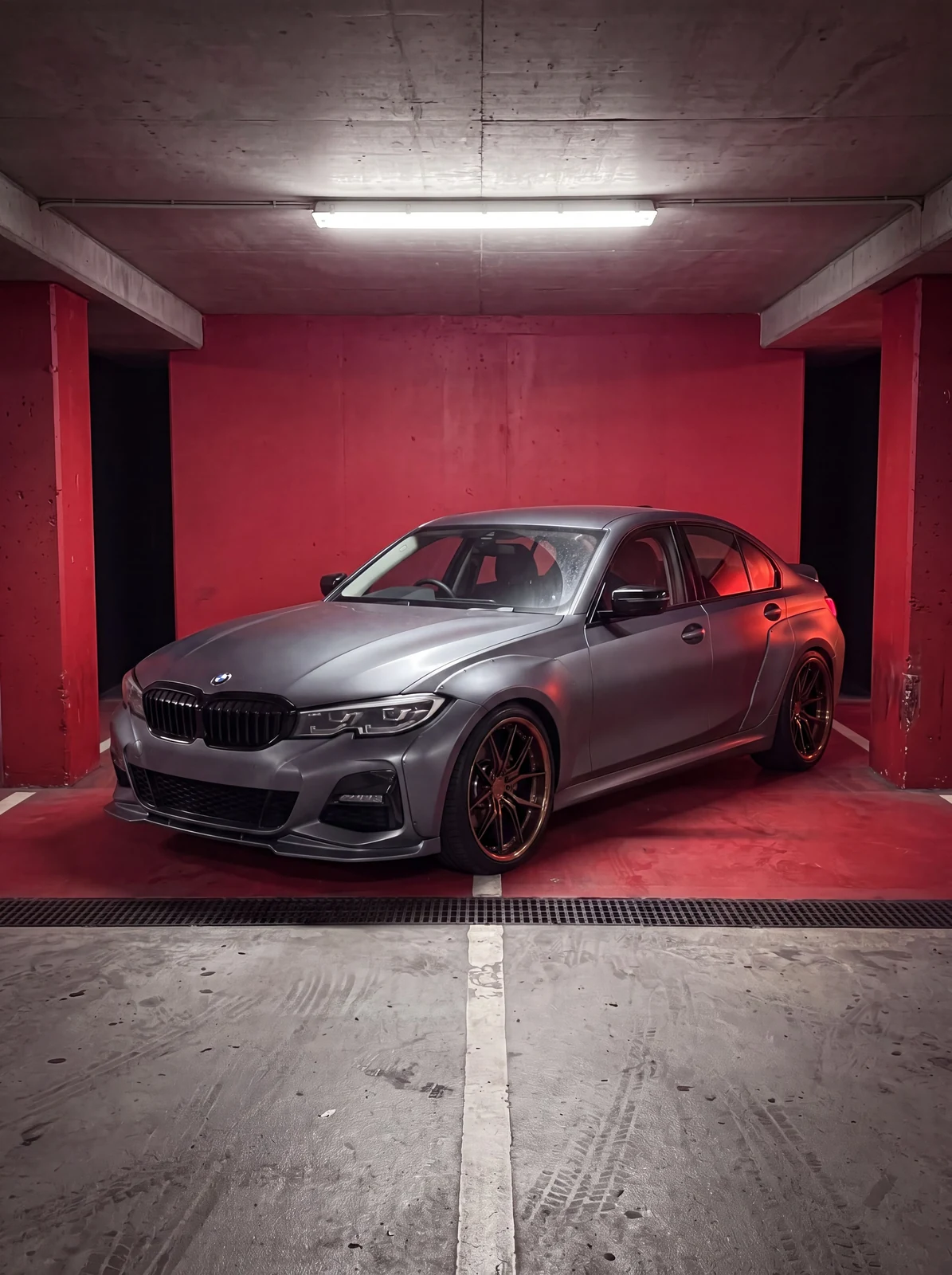 Modified BMW sedan with a front lip, side skirts and sport wheels