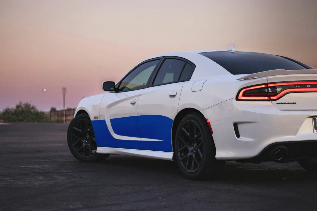 Dodge Charger with a white and blue graphic wrap