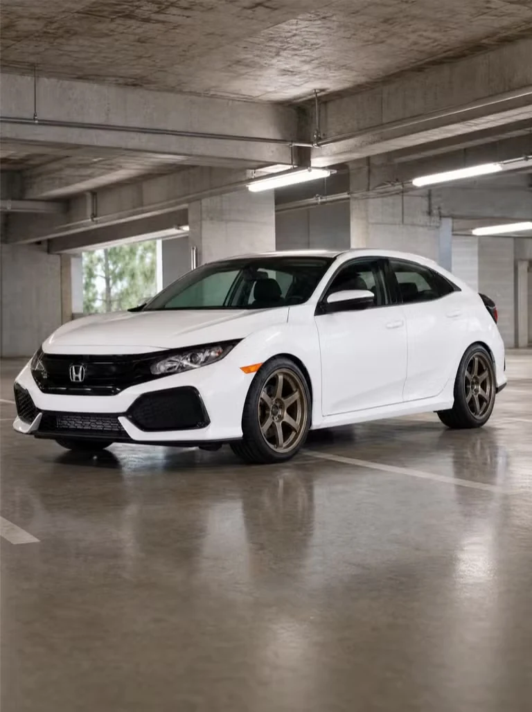 White Civic with bronze six-spoke wheels