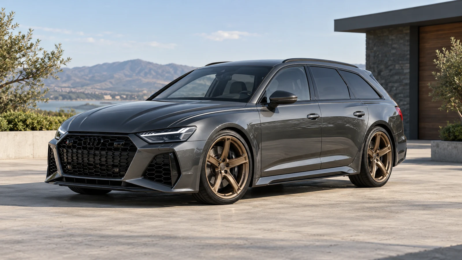 Dark gray performance wagon with bronze five-spoke wheels